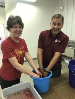 Dr. Gill Giese with Kelly Giese making Cherry Wine